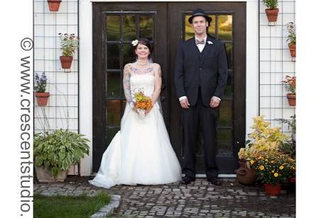 A very cute pose! in front of the old outbuilding