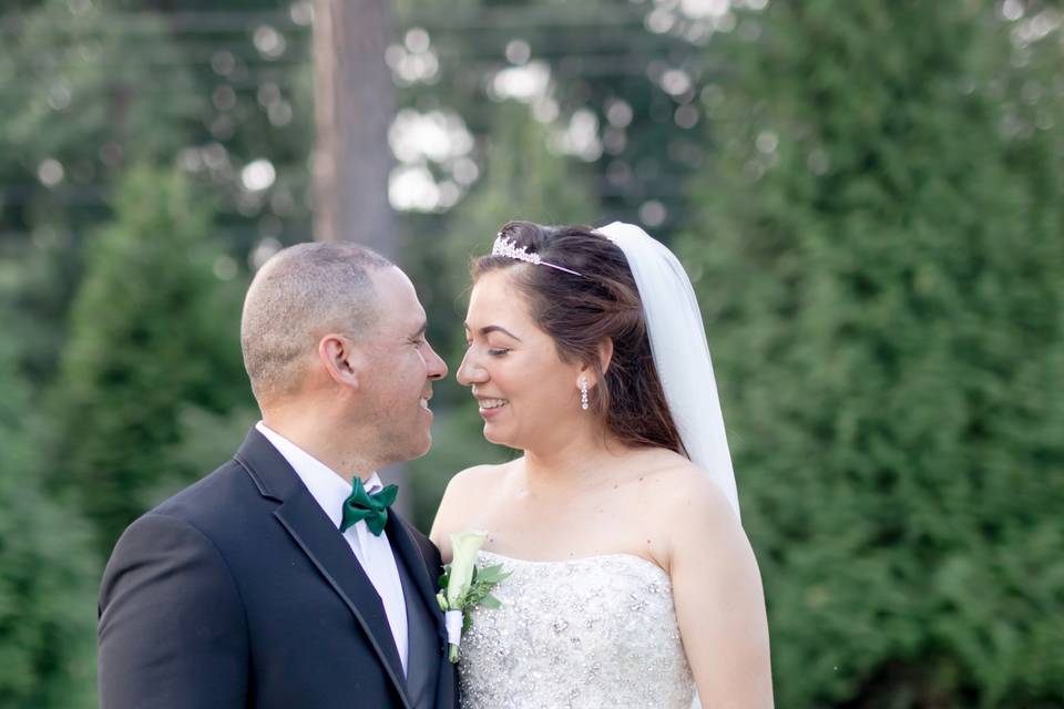 Bride, groom, and bouquet