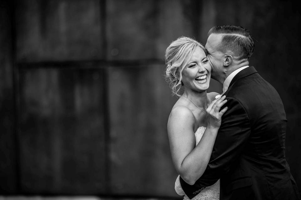 Giggling bride and groom