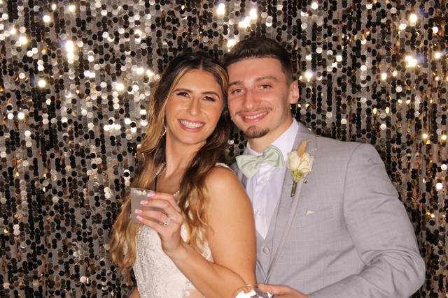 Sequin backdrop bride & groom