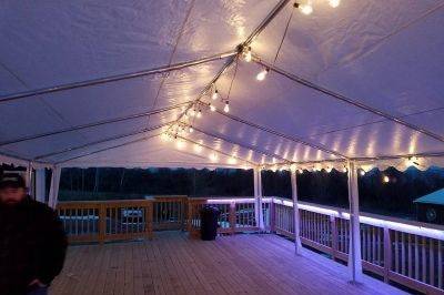 The deck can accommodate tables/chairs or more pub style setting.