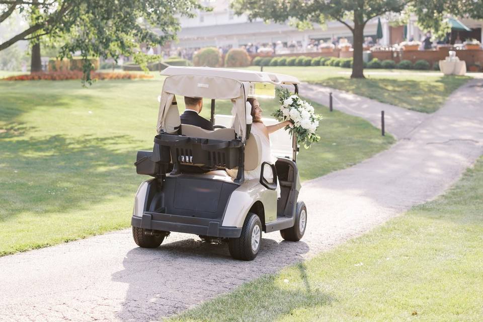 Couple on golf cart