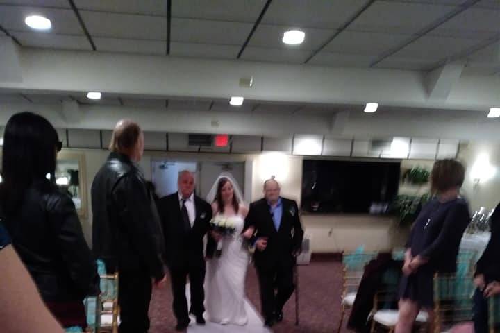 Bride and her step dad ad dad