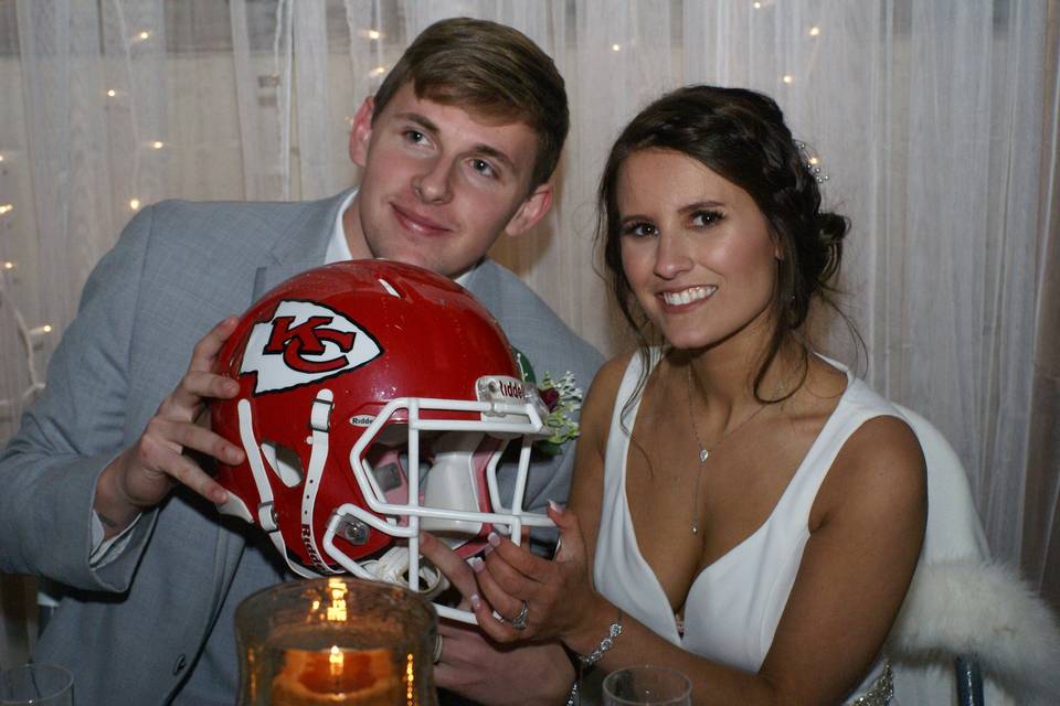 Happy couple with sporting props!