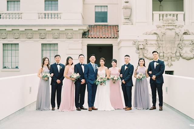 Newlyweds, bridesmaids, and groomsmen