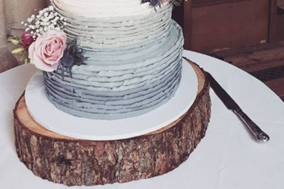 Grey ombre ruffle wedding cake