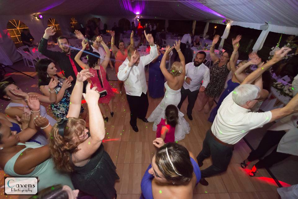 Couple and guests dancing