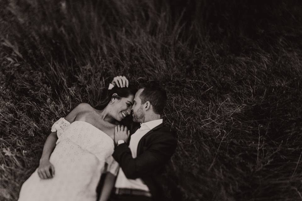 Couple in a field black and white