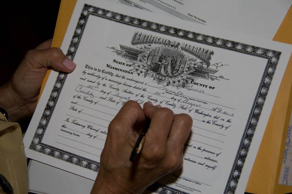 Signing the wedding certifcate