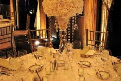 Large white roses with crystals for this table design. White, white, white. A clean design