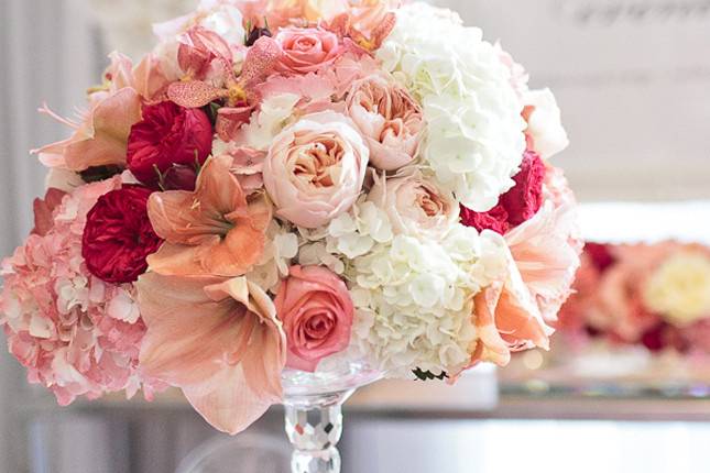 Deep and soft pinks accented with white flowers.