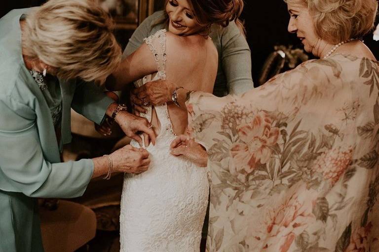 Buttoning up the dress