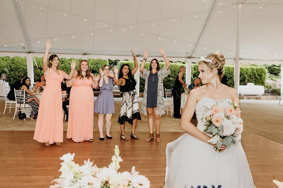 Tossing the bouquet - Mecca R. Photography