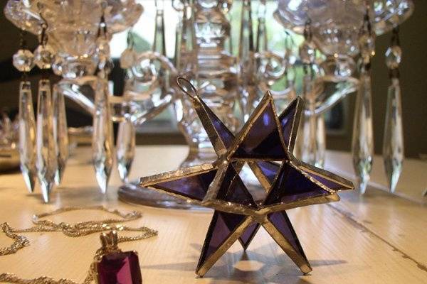 Stained Glass Amethyst Moravian Star Favor.  Designed to either hang or stand. Size: 2.5