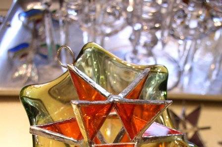 Stained Glass Spessartine Moravian Star Favor.  Designed to either hang or stand. Size: 2.5