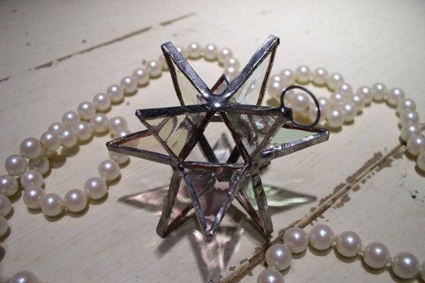 Stained Glass Clear Iridescent Moravian Star Favor.  Designed to either hang or stand. Size: 2.5