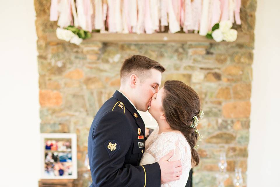 Groom kissing his bride