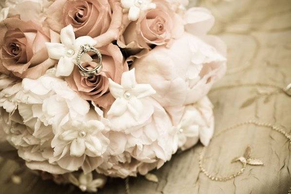 Bridal bouquet and wedding ring