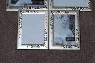 Engraved photo frames - either in wood or metal.
