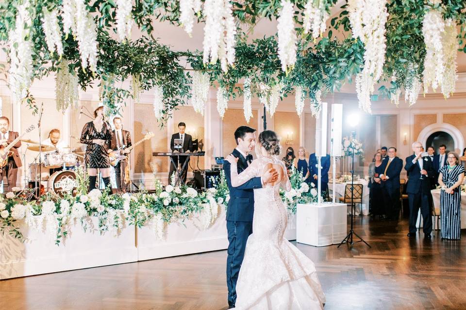 Chandelier + stage flowers