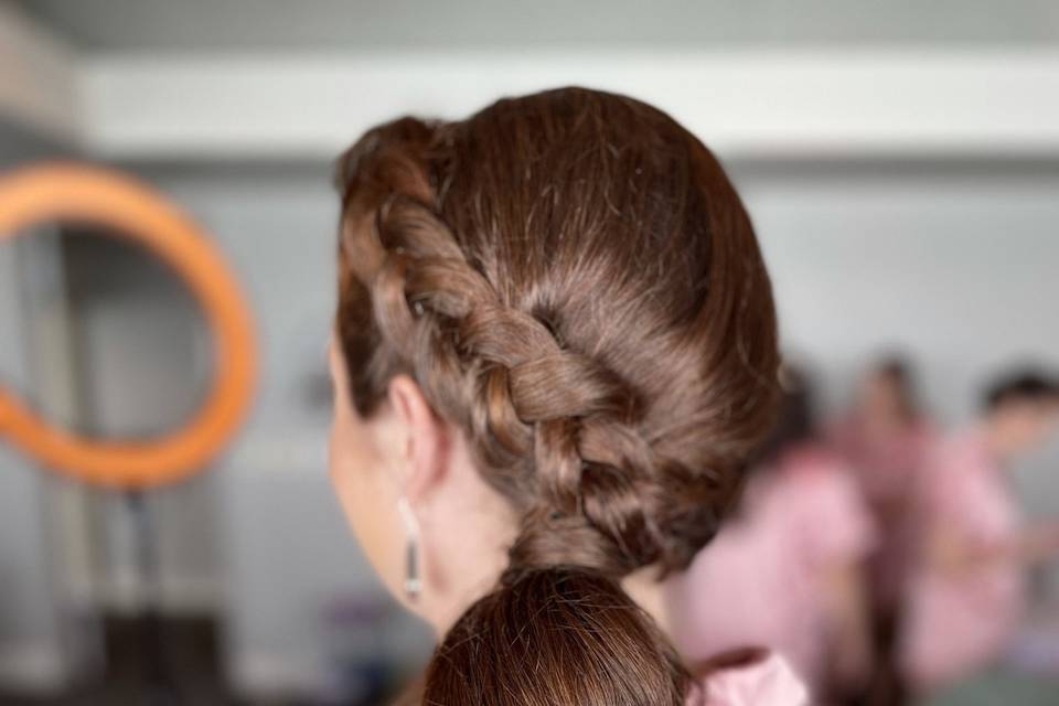 Side swept ponytail with braid
