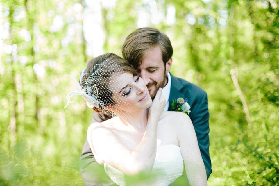 Groom hugging the bride