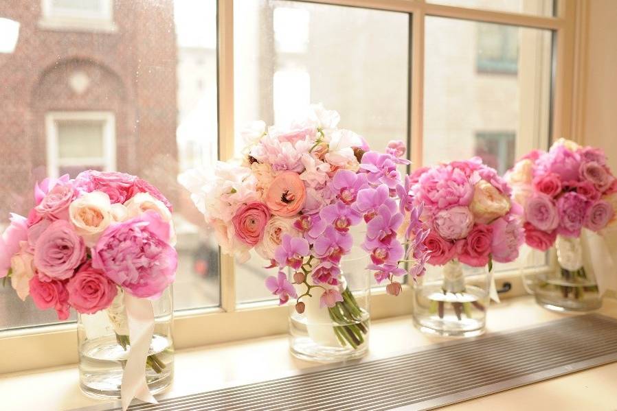 pink romantic bridal and bridesmaid bouquet, peonies phalaenopsis orchd, Japanese Lysianthus, Dutch Garden Roses, French Ranonculus, French Anemones