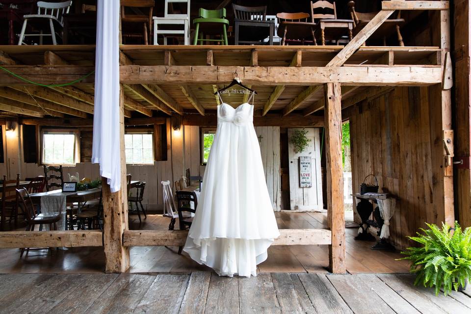 Wedding dress in barn