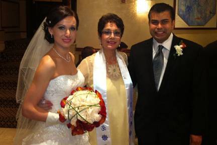 Couple with the officiant