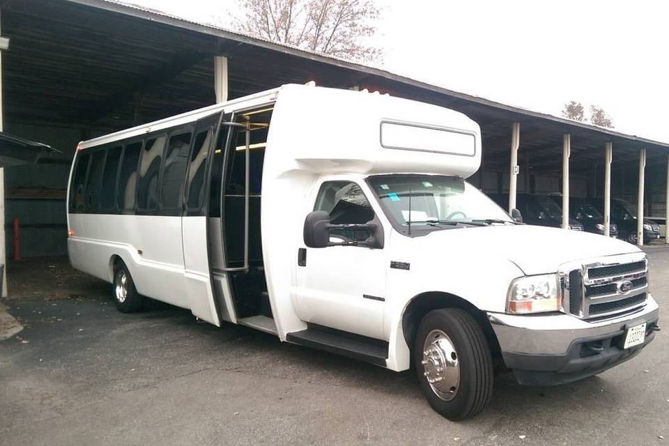 Outside 32 passenger limo bus