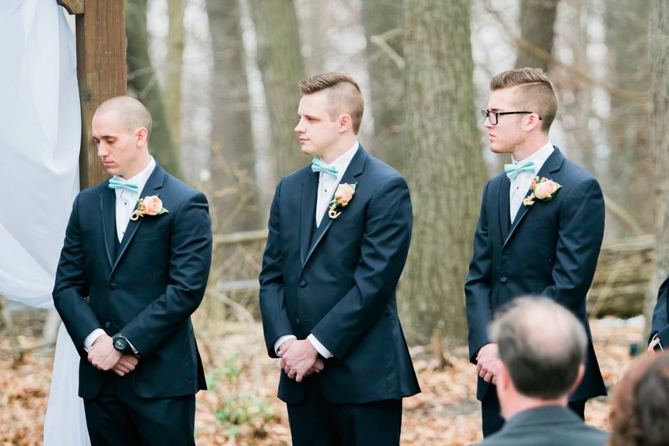 Three dapper groomsmen