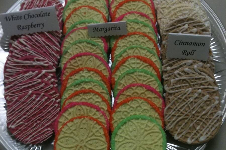 Assorted flavors of pizzelle cookies
