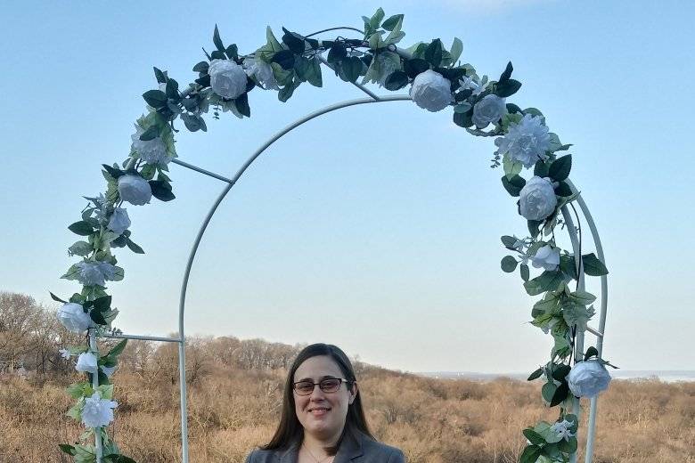 Officiant under arch