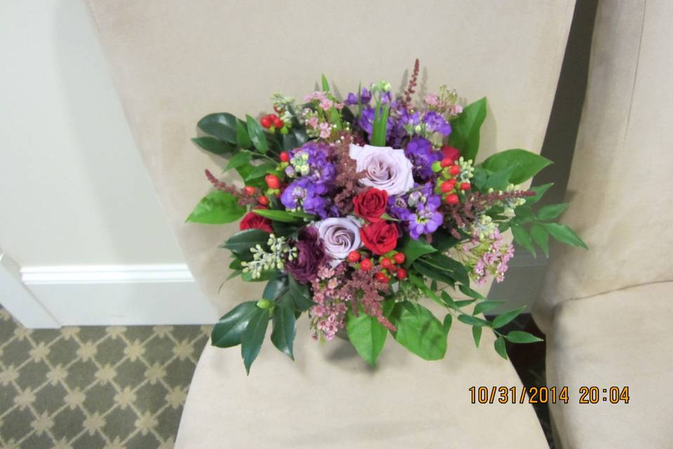 White flower arrangement with purple details