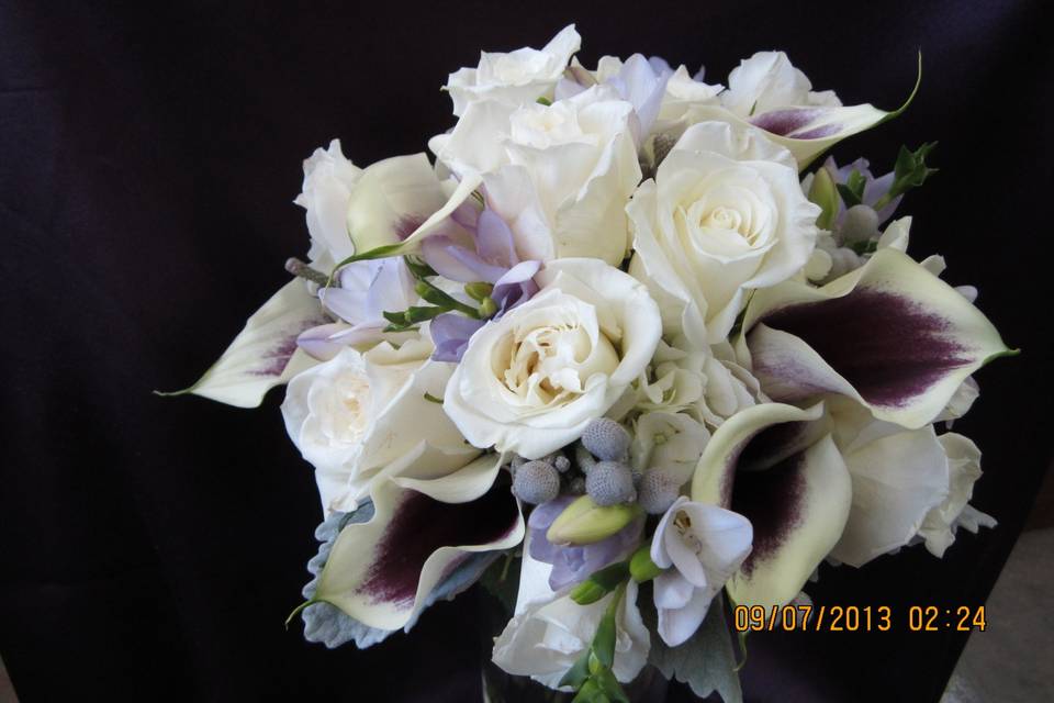 White flower arrangement with purple details