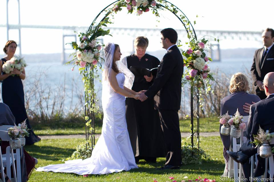 Newlyweds with the officiant