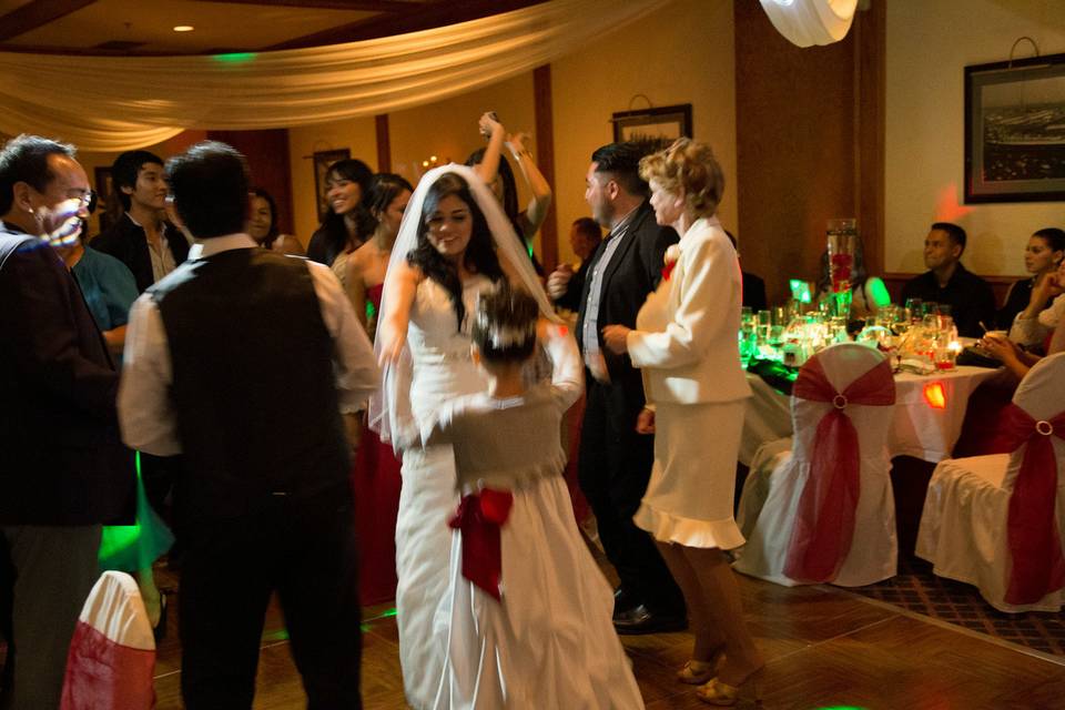 Bride and guests dancing