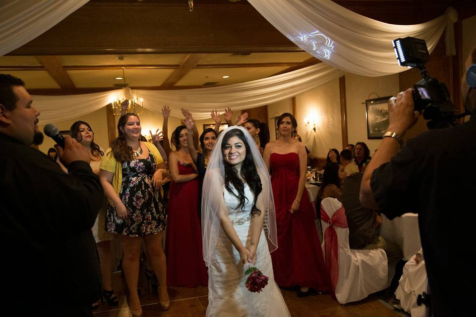 Bride and guests dancing