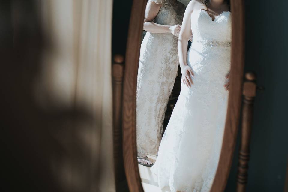 Bride getting dressed