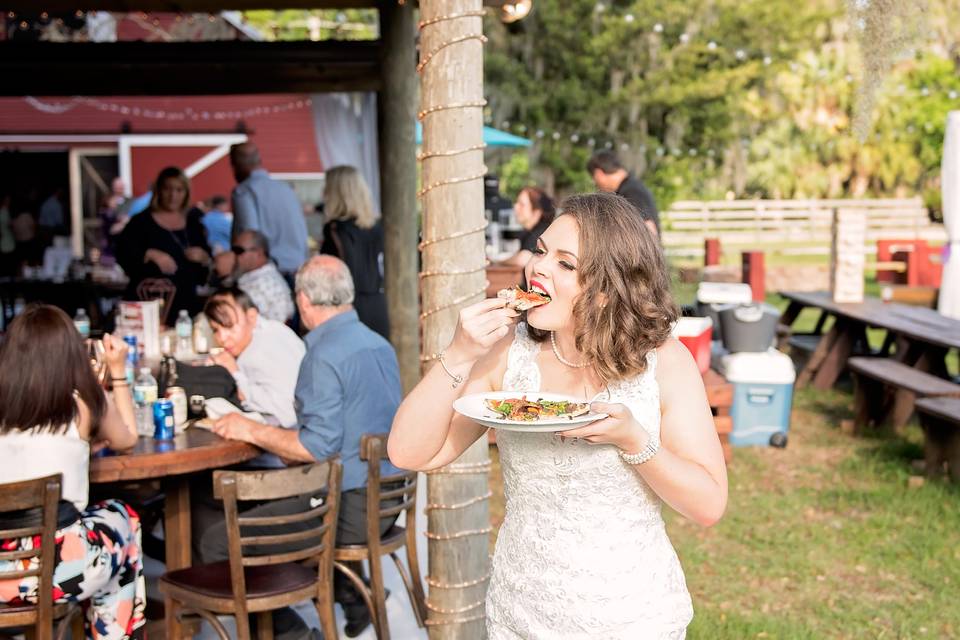 Newlywed enjoys an al fresco pizza