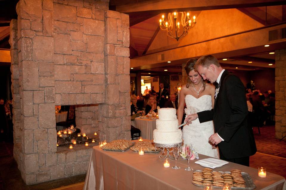 Couple slicing the cake