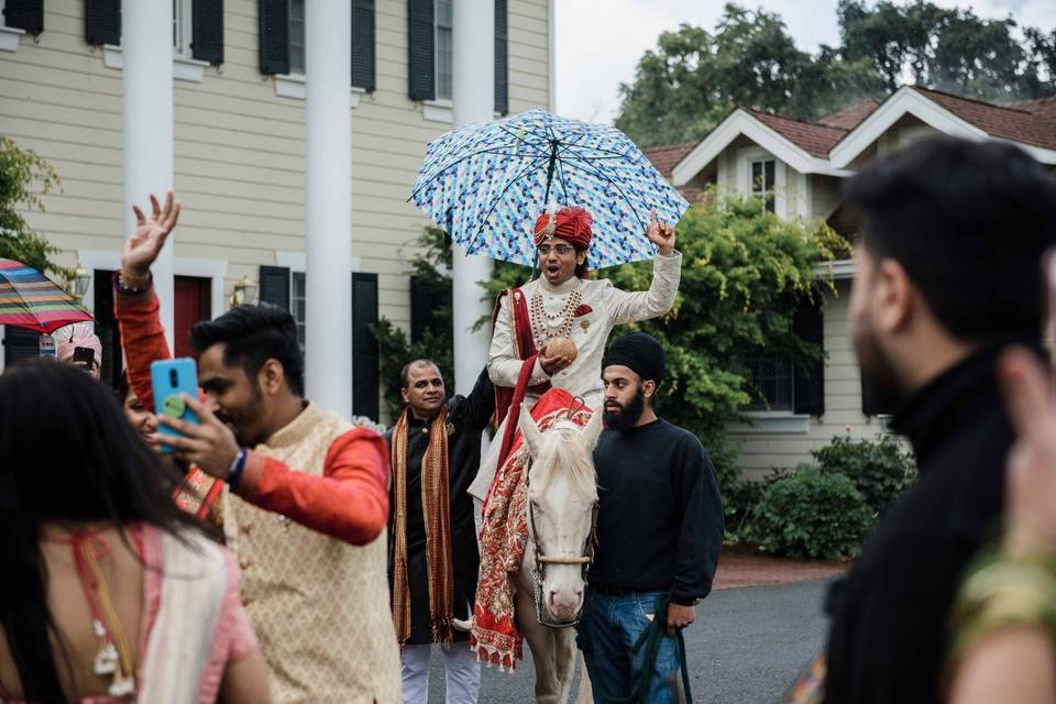 A groom arriving on horseback