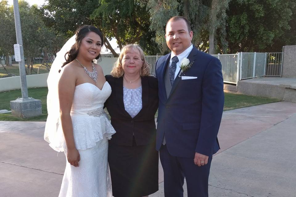 Couple with the officiant