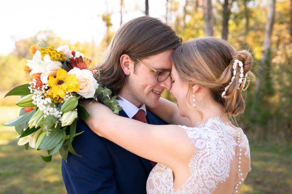 Happy first look embrace