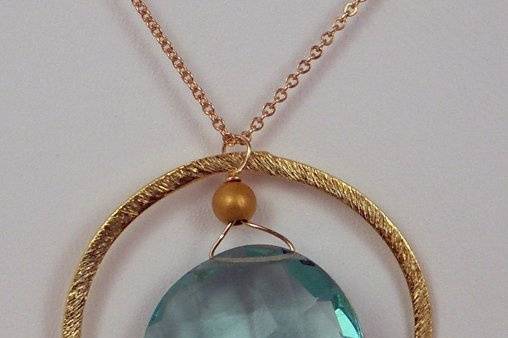 Gold circle necklace with aqua quartz!
$45