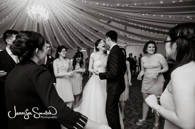 The couple with the bridesmaids and groomsmen