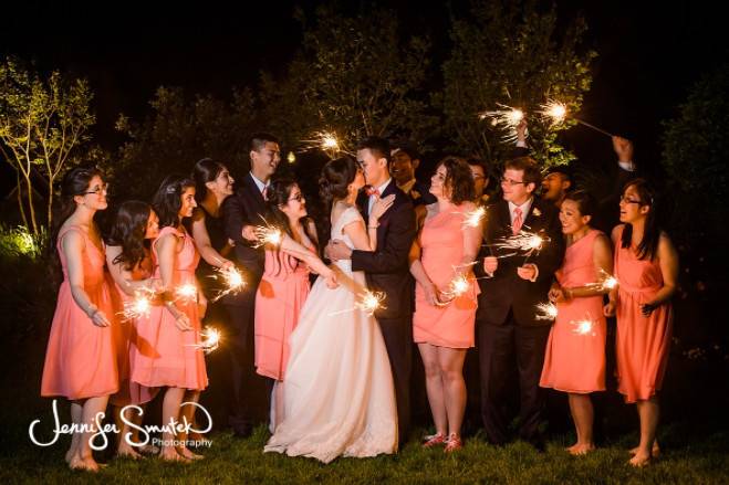 The couple with the bridesmaids and groomsmen