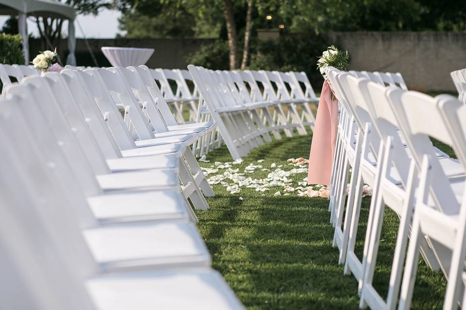 White chairs with petals