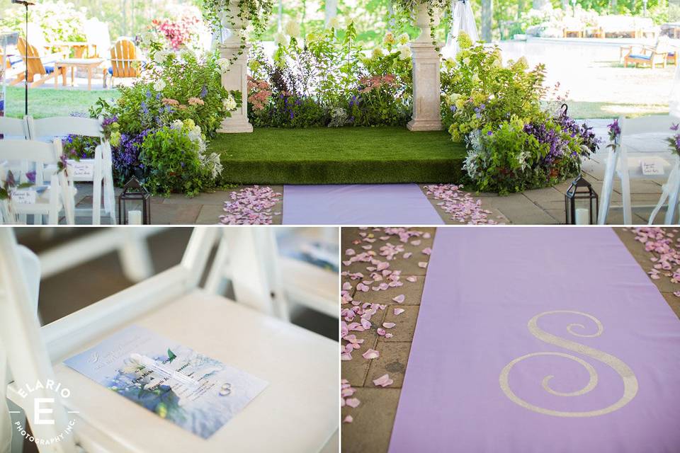 Tented garden ceremony with monogrammed isle runner.