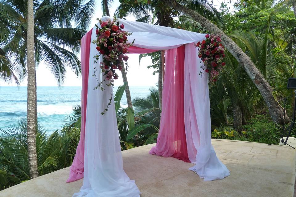Pink and white fabric ceremony decor